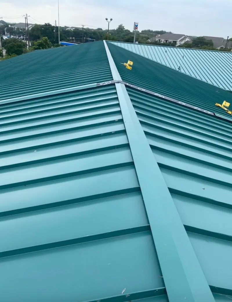 Green commercial metal roof ridge and valley for Metal Roof Repair in Pass Christian
